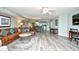 Spacious open-plan living space featuring modern furnishings, kitchen, and a seamless flow throughout at 2151 Bridge View Ct. # 2302, North Myrtle Beach, SC 29582