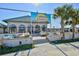 Exterior view of the Sunset Bistro with outdoor seating and vibrant signage at 2151 Bridge View Ct. # 2302, North Myrtle Beach, SC 29582