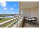Balcony with seating and water views with boats docked in the distance at 2151 Bridgeview Ct. # 3-405, North Myrtle Beach, SC 29582