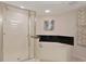 Bathroom with a glass-enclosed shower and a corner bathtub at 2151 Bridgeview Ct. # 3-405, North Myrtle Beach, SC 29582