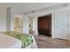 Bedroom with wardrobe and doors leading to a bathroom at 2151 Bridgeview Ct. # 3-405, North Myrtle Beach, SC 29582
