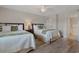 Bedroom featuring two twin beds and a door that leads to a bathroom at 2151 Bridgeview Ct. # 3-405, North Myrtle Beach, SC 29582