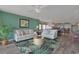 Open-concept living area with modern decor, seamlessly flows into the dining area and kitchen at 2151 Bridgeview Ct. # 3-405, North Myrtle Beach, SC 29582