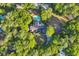 Aerial view of the property, showcasing the pool and lush surroundings at 217 Myrtle Ln., Myrtle Beach, SC 29572