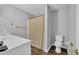 Simple bathroom with a standard shower stall, vanity, and toilet; the space is clean and functional at 217 Myrtle Ln., Myrtle Beach, SC 29572