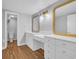 Bright bathroom showcasing a double vanity with generous counter space and natural light, blending beauty and functionality at 217 Myrtle Ln., Myrtle Beach, SC 29572
