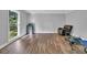 Bright bedroom with ample natural light and wood flooring, offering a cozy retreat at 217 Myrtle Ln., Myrtle Beach, SC 29572