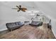 Spacious bonus room with vaulted ceilings, modern sofas, and ample natural light for versatile use at 217 Myrtle Ln., Myrtle Beach, SC 29572