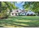 Charming home with a well-manicured lawn, mature trees, and a classic design at 217 Myrtle Ln., Myrtle Beach, SC 29572