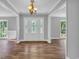 Elegant foyer with hardwood floors and decorative lighting, creating a welcoming entrance at 217 Myrtle Ln., Myrtle Beach, SC 29572