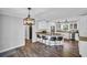 Modern kitchen with stainless steel appliances, granite countertops, and a breakfast bar at 217 Myrtle Ln., Myrtle Beach, SC 29572