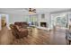 Cozy living room with a fireplace, comfortable seating, and plenty of space at 217 Myrtle Ln., Myrtle Beach, SC 29572