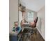 Small study room with hardwood floors, minimalist decor, and natural light from a bright window at 217 Myrtle Ln., Myrtle Beach, SC 29572