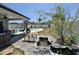 Expansive backyard featuring a pond, pool area, covered patio, and landscaping, creating a serene outdoor oasis at 2217 Belladora Rd., Conway, SC 29527