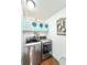 Well-organized laundry room featuring modern washer and dryer units, with wall decorations and stylish design at 2217 Belladora Rd., Conway, SC 29527