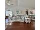 Bright living room featuring hardwood floors, vaulted ceilings, and modern beach-themed decor at 2217 Belladora Rd., Conway, SC 29527