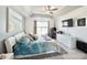 Inviting main bedroom boasts a tray ceiling, calming color palette, and work station at 2217 Belladora Rd., Conway, SC 29527