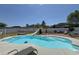 Sparkling in-ground pool with lounge area and slide, creating a perfect backyard oasis for relaxation and fun at 2217 Belladora Rd., Conway, SC 29527