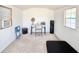 Versatile shed interior with neutral carpeting and ample desk space, perfect as an office or hobby area at 2217 Belladora Rd., Conway, SC 29527