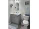 Charming bathroom with gray vanity, toilet, and decorative coastal accents at 224 Castle Dr. # 1408, Myrtle Beach, SC 29579