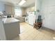 Bright kitchen featuring tile flooring, matching appliances, and ample counter space by the doorway at 224 Castle Dr. # 1408, Myrtle Beach, SC 29579