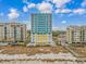 Aerial shot of condo complex with a pool, beach access, and ocean views at 2301 S Ocean Blvd. # 1202, North Myrtle Beach, SC 29582