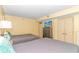 Charming bedroom with twin beds, closet, dresser, and TV for relaxed vacation living at 2301 S Ocean Blvd. # 1202, North Myrtle Beach, SC 29582
