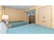 Inviting bedroom featuring twin beds, closet and TV for relaxed vacation living at 2301 S Ocean Blvd. # 1202, North Myrtle Beach, SC 29582