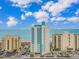 Stunning exterior view of oceanfront condo building with direct beach access and amazing ocean views at 2301 S Ocean Blvd. # 1202, North Myrtle Beach, SC 29582