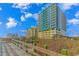 Low angle view of high rise condo near the beach, with a boardwalk at 2301 S Ocean Blvd. # 1202, North Myrtle Beach, SC 29582