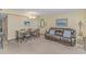 Inviting living room with a dining area, plush seating, and tasteful decor creating a comfortable living space at 2301 S Ocean Blvd. # 1202, North Myrtle Beach, SC 29582