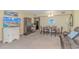 Bright living area with a TV, dining space, and comfortable sofa offering a versatile and inviting atmosphere at 2301 S Ocean Blvd. # 1202, North Myrtle Beach, SC 29582