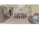 Spacious living room featuring dining and kitchen access, perfect for entertaining and everyday living at 2301 S Ocean Blvd. # 1202, North Myrtle Beach, SC 29582