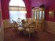 Dining room featuring a glass table, upholstered chairs, and a china cabinet for storage at 2333 Brick Dr., Longs, SC 29568