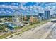 Stunning aerial view of a beachside city with a Ferris wheel and luxury condos near the ocean at 2401 S Ocean Blvd. # 752, Myrtle Beach, SC 29577