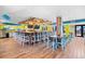 Spacious bar features modern fixtures, a long counter with stools, and ample seating arrangements at 2401 S Ocean Blvd. # 752, Myrtle Beach, SC 29577