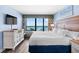Bedroom featuring ocean views, a dresser, and a comfortable queen bed at 2401 S Ocean Blvd. # 752, Myrtle Beach, SC 29577