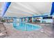 Well-maintained indoor pool area with blue decor, brick flooring, and plenty of natural light at 2401 S Ocean Blvd. # 752, Myrtle Beach, SC 29577