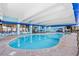 Bright and spacious indoor swimming pool featuring a shallow end with brick accents and easy access at 2401 S Ocean Blvd. # 752, Myrtle Beach, SC 29577