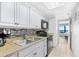 Well-maintained kitchen with appliances, countertops, and cabinets at 2401 S Ocean Blvd. # 752, Myrtle Beach, SC 29577