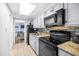 Functional kitchen with modern appliances and an open view to the living room at 2401 S Ocean Blvd. # 752, Myrtle Beach, SC 29577
