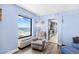 Living area with recliner, a beach view from the large window and access to the kitchen at 2401 S Ocean Blvd. # 752, Myrtle Beach, SC 29577