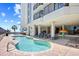 Inviting outdoor pool with chaise lounges, lush landscaping, and a relaxing atmosphere near the beach at 2401 S Ocean Blvd. # 752, Myrtle Beach, SC 29577