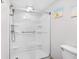 Clean bathroom featuring a glass shower with shower seat and wall art at 2401 S Ocean Blvd. # 752, Myrtle Beach, SC 29577