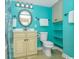 Bathroom with blue walls and light cabinets at 2801 S Ocean Blvd. # 339, North Myrtle Beach, SC 29582