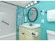 Bathroom with blue walls and light cabinets at 2801 S Ocean Blvd. # 339, North Myrtle Beach, SC 29582