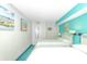 Comfortable bedroom with bright blue walls and two beds at 2801 S Ocean Blvd. # 339, North Myrtle Beach, SC 29582