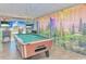 Game room features a pool table, TVs, and decorative wall art at 2801 S Ocean Blvd. # 339, North Myrtle Beach, SC 29582
