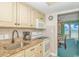 Kitchen with stainless appliances and light cabinets at 2801 S Ocean Blvd. # 339, North Myrtle Beach, SC 29582