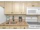 Kitchen with stainless appliances and light cabinets at 2801 S Ocean Blvd. # 339, North Myrtle Beach, SC 29582